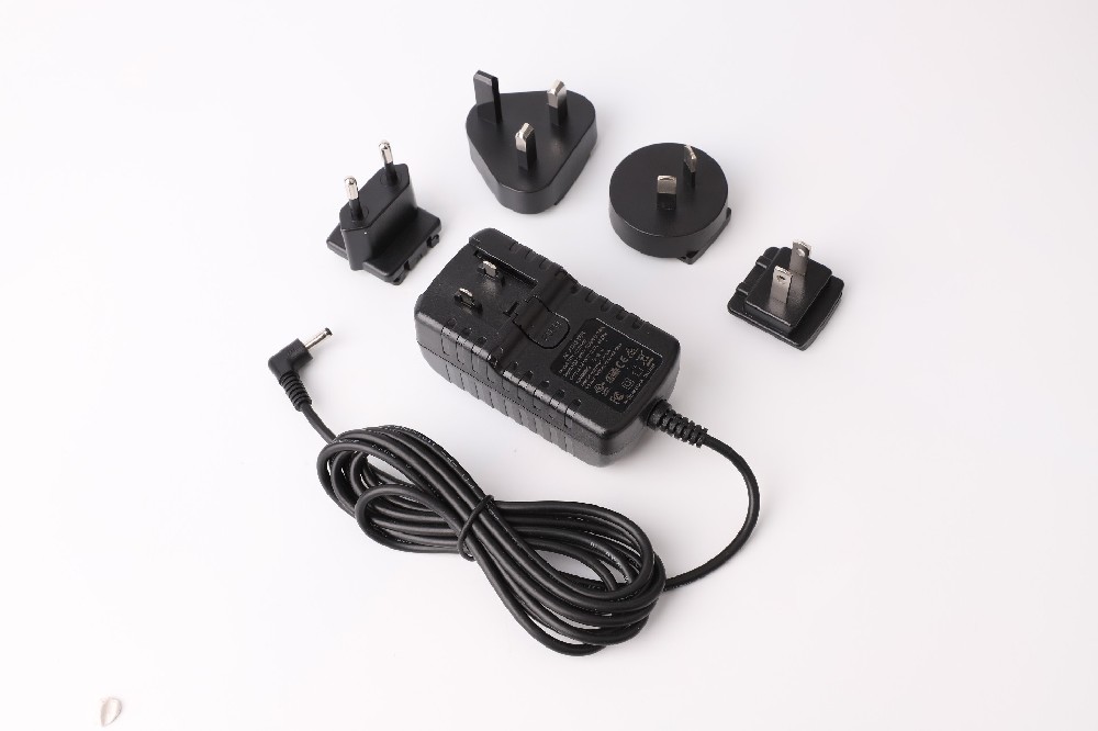 Interchangeable EU UK AU US plug ac 100-240v to dc 12v 2a power supply adapter adaptor for cctv security camera
