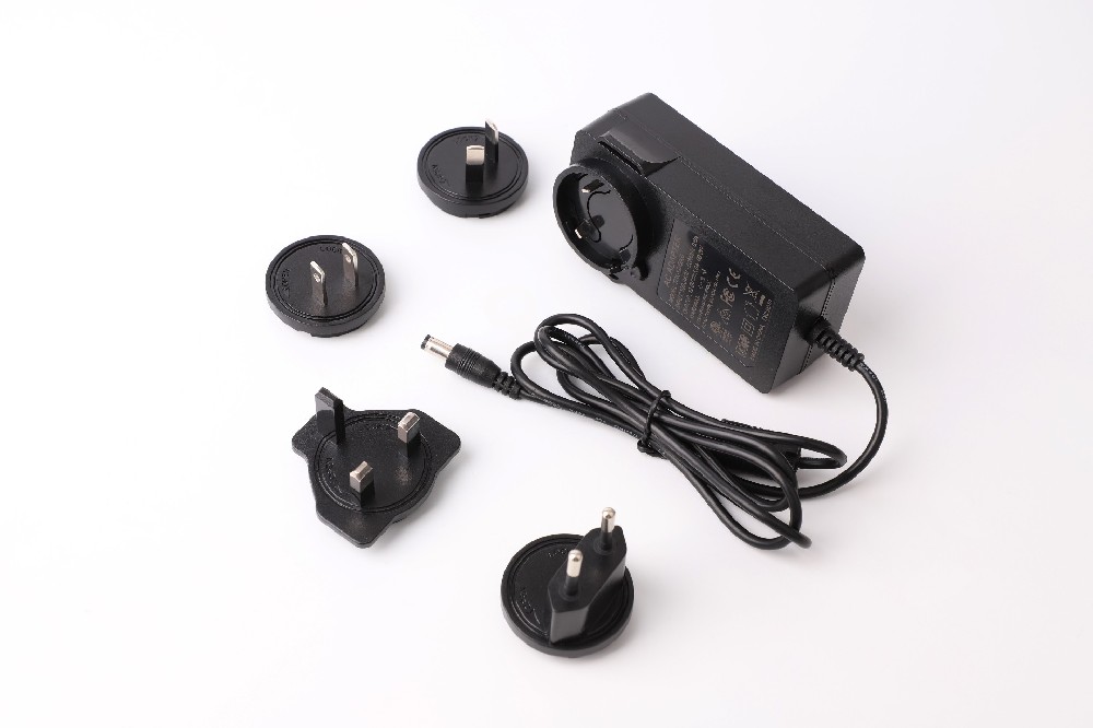 Shenzhen supplier power adapter 12v5a interchangeable wall plug power supply adapter 12v 5a for LED Cctv Router Laptop